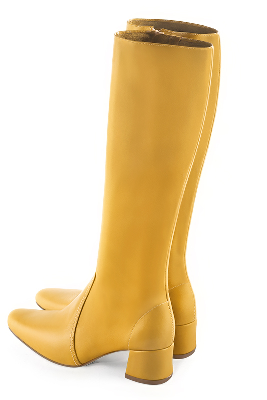 Mustard yellow women's feminine knee-high boots. Round toe. Low flare heels. Made to measure. Rear view - Florence KOOIJMAN